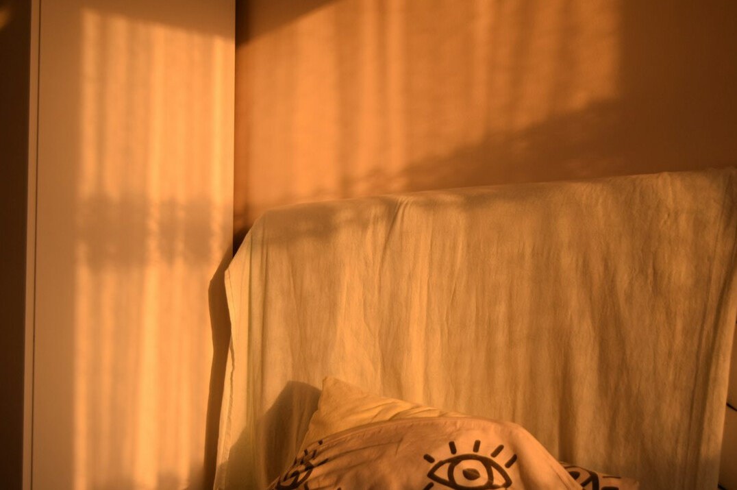 woman journaling in morning light